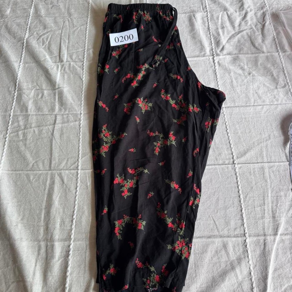Caribou New York black rayon pants with red & green floral print